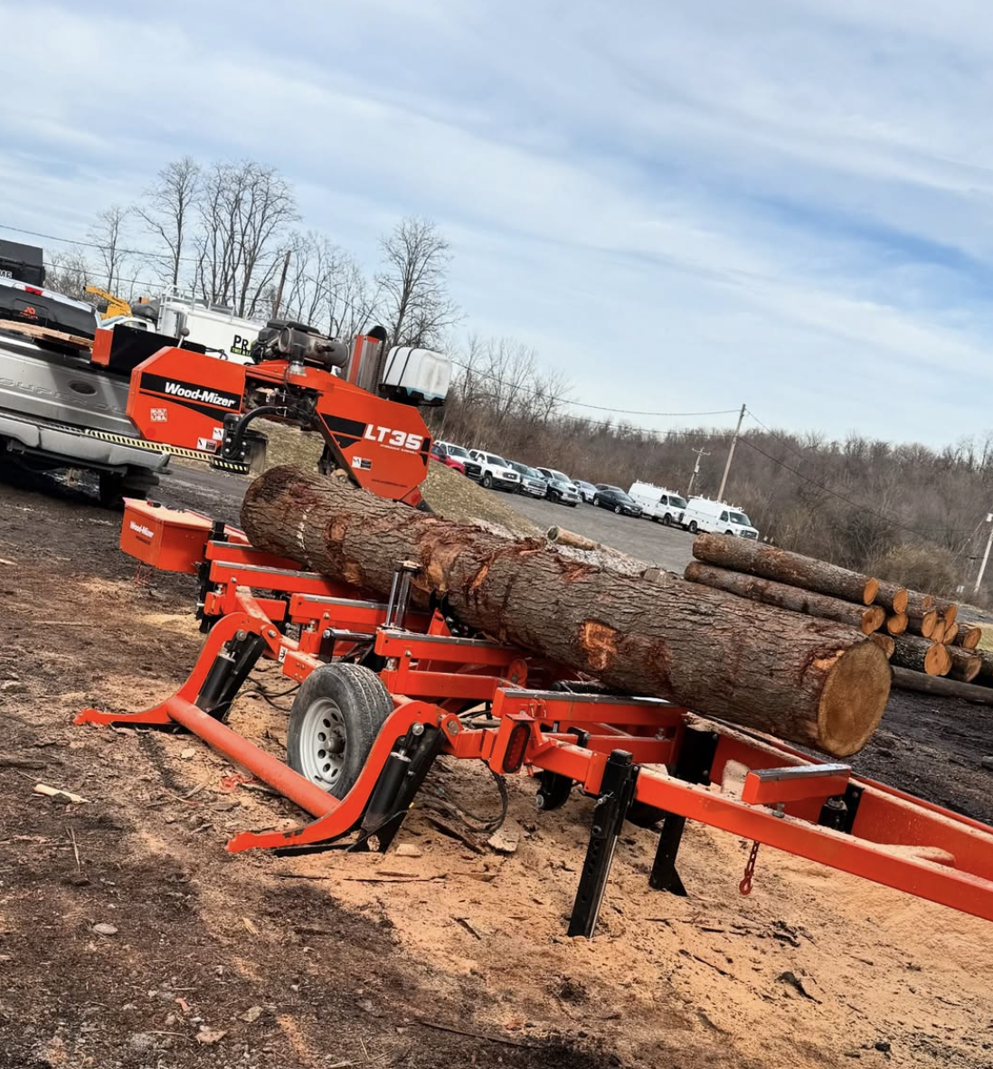 On-site lumber milling in Pittsburgh turning a removed tree into usable wood slabs by Primetime Tree & Landscape